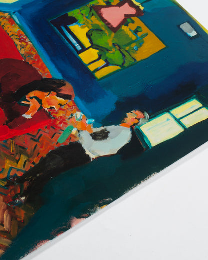 Woman Reading on a Red Sofa
